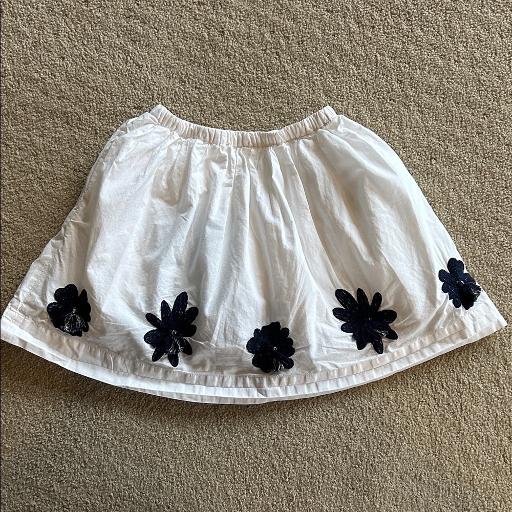 Elegant White Skirt with Black Floral Accents